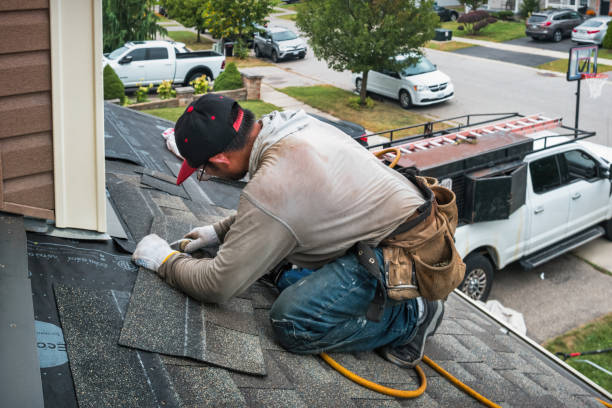 Professional Gutter Installation technician working in Louisville, IL